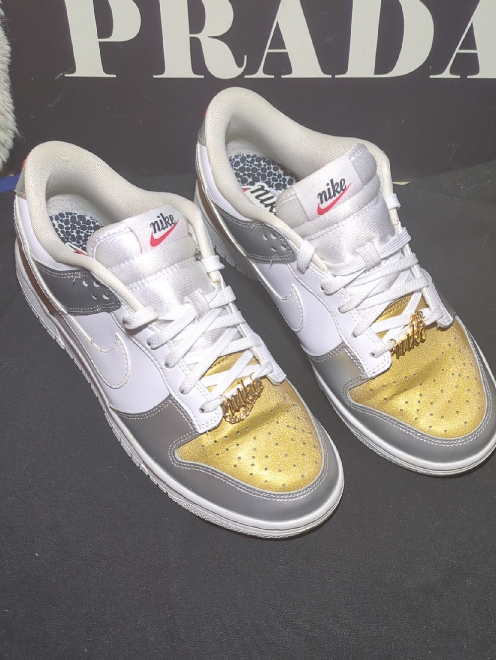 Nike Women’s Dunk Low SE " Heirloom"  in White Metallic Gold & Silver $75